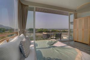 ELIVAAS Meraki Villa - Luxe 5 BHK Glass Villa With Private Pool, Balcony, Garden & Gazebo