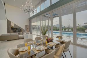 ELIVAAS Meraki Villa - Luxe 6 BHK Glass Villa With Private Pool, Balcony, Garden & Gazebo