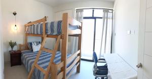 Apartamento de playa y piscina, Mejia