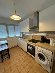 Appartements T4 spacieux renove parking - Stade-Arena-Eurexpo : photos des chambres