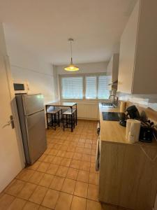 Appartements T4 spacieux renove parking - Stade-Arena-Eurexpo : photos des chambres