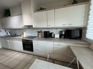 Appartements 100 m T3 with loggia - Eurexpo-Groupama Stadium : photos des chambres