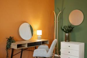 MAISUITES Sperling - Zentrale Ferienwohnung mit Boxspringbett, Kaffeevollautomat, WLAN & seitlichem Seeblick