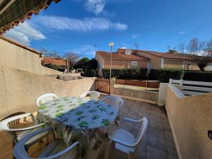 Maison de vacances, séjour cuisine, résidence MAS DE LA PLAGE 1, terrasse Sud dégagée 4 couchages Portiragnes LRMP77