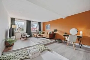 MAISUITES Sperling - Zentrale Ferienwohnung mit Boxspringbett, Kaffeevollautomat, WLAN & seitlichem Seeblick - Römnitz