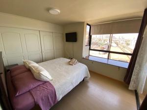 En Iquique, Chile, depto diario frente a playa Brava