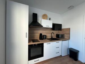 Charmant studio avec coin nuit & cuisine extérieur agréable 22B