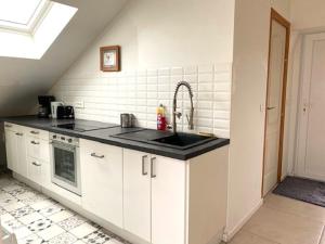 Appartements Appartement sous les combles : photos des chambres
