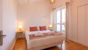 Appartements Les Cygnes - exceptional location with lake view - 3 bedrooms : photos des chambres