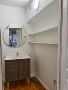 Appartements Studio cosy avec clim et jardin : photos des chambres