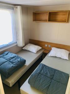 Campings MOBIL HOME LUXUEUX de 3ch - CAMPING LA PIGNADE 4 Etoiles - RONCE-LES-BAINS - COTE ATLANTIQUE : photos des chambres