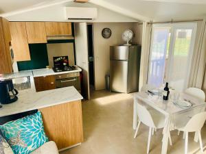 Campings MOBIL HOME LUXUEUX de 3ch - CAMPING LA PIGNADE 4 Etoiles - RONCE-LES-BAINS - COTE ATLANTIQUE : photos des chambres