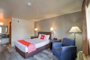 Queen Room room in OYO Woodland Hotel and Suites