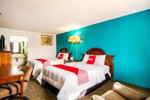 Queen Room with Two Queen Beds room in OYO Hotel Hutchinson KS West 4th Ave