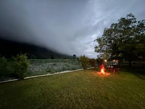 Birdsong 6BR Stay with Riverside by Homeyhuts