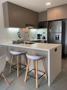 Suite de lujo con balcón en Edificio NEO