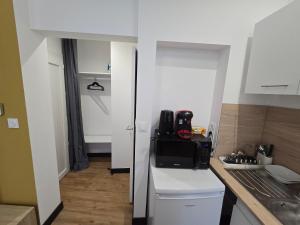 E1 - Charmant studio en intramuros, rénové climatisé