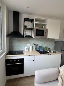Appartements 2P cosy aux portes de Paris : photos des chambres