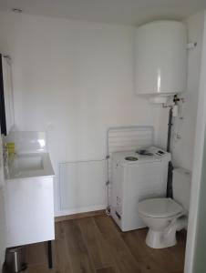 Appartements Maison partagee - Studio bas : photos des chambres