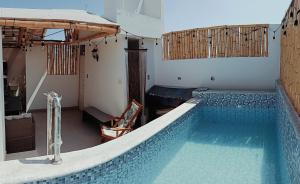 Apartamento de playa y piscina, Mejia