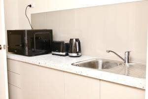 Saltwater Retreat - BBQ area with water views