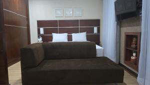 Unique Home 15min Cons USA - Smart TV e Sofá Cama