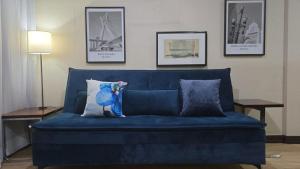 Unique Home 15min Cons USA - Smart TV e Sofá Cama