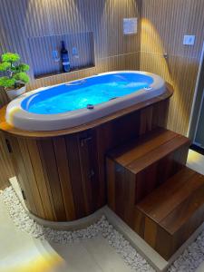 Mundarium - Chalés Temáticos com Hidromassagem e Cromoterapia