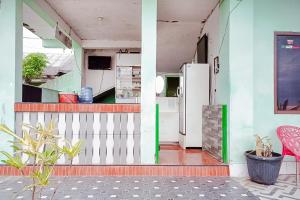 RedDoorz at Homestay OTW Manna