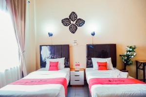 RedDoorz at Homestay OTW Manna