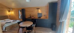 Chalets Le petit Chalet du MacQuart P.O.A. RANCH, 2 a 3 pers, : photos des chambres