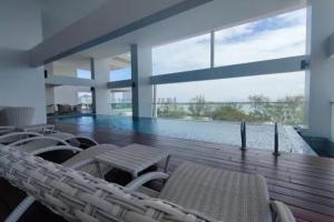 Cozy Seaview Duplex Apartment at Sunrise Gurney