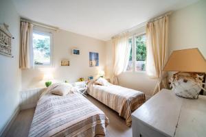 Villas Villa BARADARENA avec piscine chauffee et jardin pour 10 personnes : photos des chambres