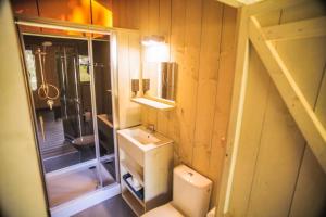 Tentes de luxe Camping Domaine le Peyral - Pionier Lodge XL : photos des chambres