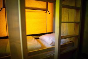 Tentes de luxe Camping Domaine le Peyral - Pionier Lodge XL : photos des chambres