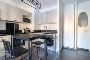 Appartements Charmant appartement proche de Paris : photos des chambres