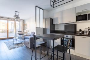 Appartements Charmant appartement proche de Paris : photos des chambres