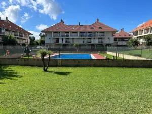 Acogedor dúplex en urbanización con piscina en Ajo - Ajo