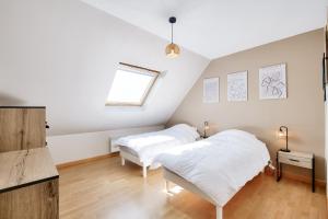 Maisons de vacances Maison pour 6 avec jardin a 500 m de la plage : photos des chambres