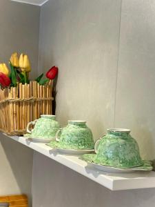 Green Cozy Home City Center by PikHost