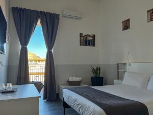 Superior Double Room with Balcony room in Arch Rome Suites