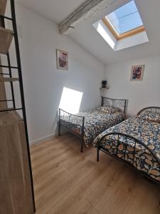Maisons de vacances Maison au coeur du village : photos des chambres