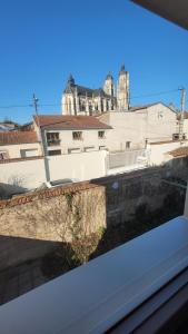 Appartements Au pied de la Basilique de Saint Nicolas de port : photos des chambres