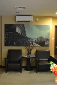 Capital O Rail Hotel