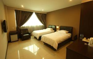 Capital O Rail Hotel
