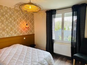 Villas Confortable maison renovee, jardin clos, 1km plage : photos des chambres