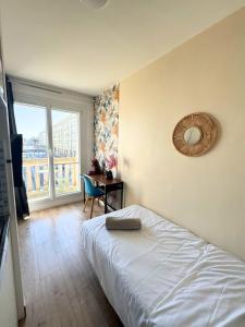 B&B / Chambres d'hotes L'Escale Appartements et Suites en bord de Mer : photos des chambres