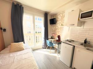 B&B / Chambres d'hotes L'Escale Appartements et Suites en bord de Mer : photos des chambres