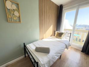 B&B / Chambres d'hotes L'Escale Appartements et Suites en bord de Mer : photos des chambres