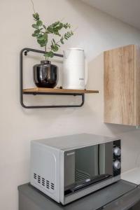 Modern Minimalist Studio with Balcony & Sunset View